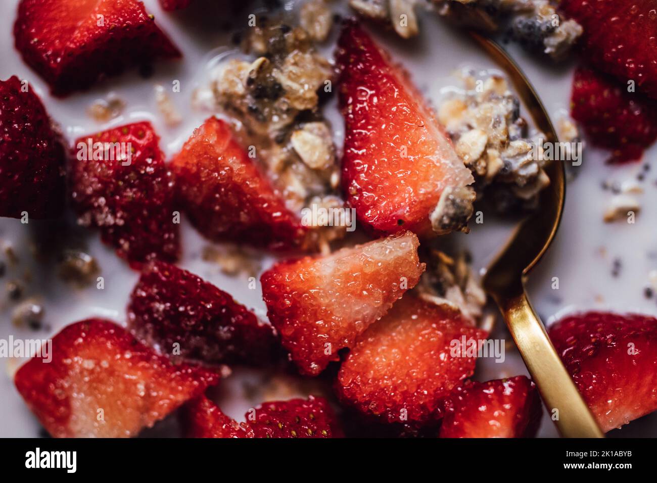 overnight oats with chia, strawberries, and sugar granules Stock Photo