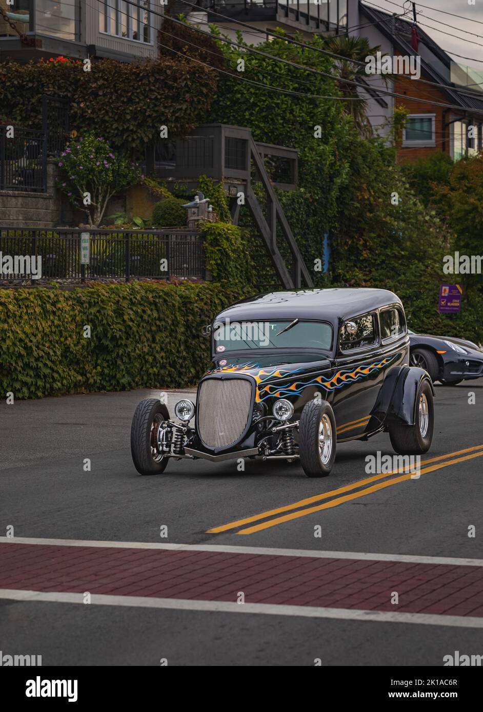 A 1933 Ford roadster at the rally car shows. Vintage Ford highboy hot rod driving in the downtown White Rock BC Canada-September 15,2022. Travel photo Stock Photo