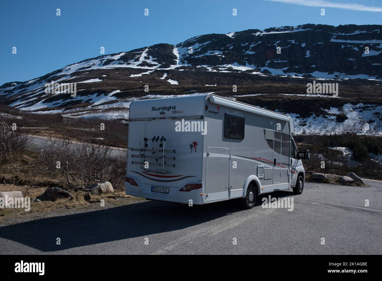 Campervan at Sjona fjord at Helgelands coast in Nordland county in central Norway. Stock Photo