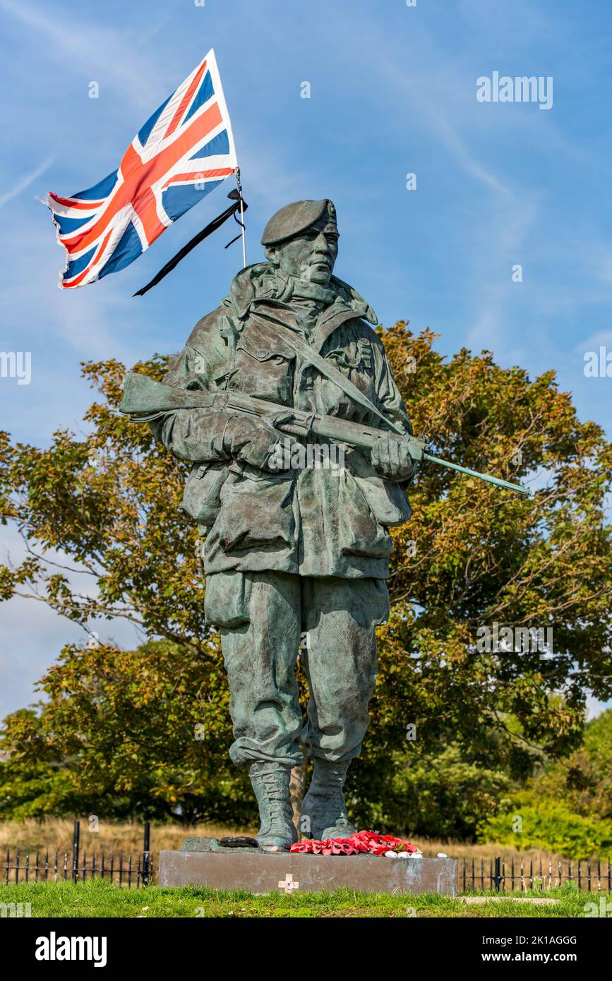 The 'Yomper' memorial at the former RM Barracks / Museum, Portsmouth, UK on 11/9/22. Black mourning ribbon flies as a mark of respect to HM The Queen. Stock Photo