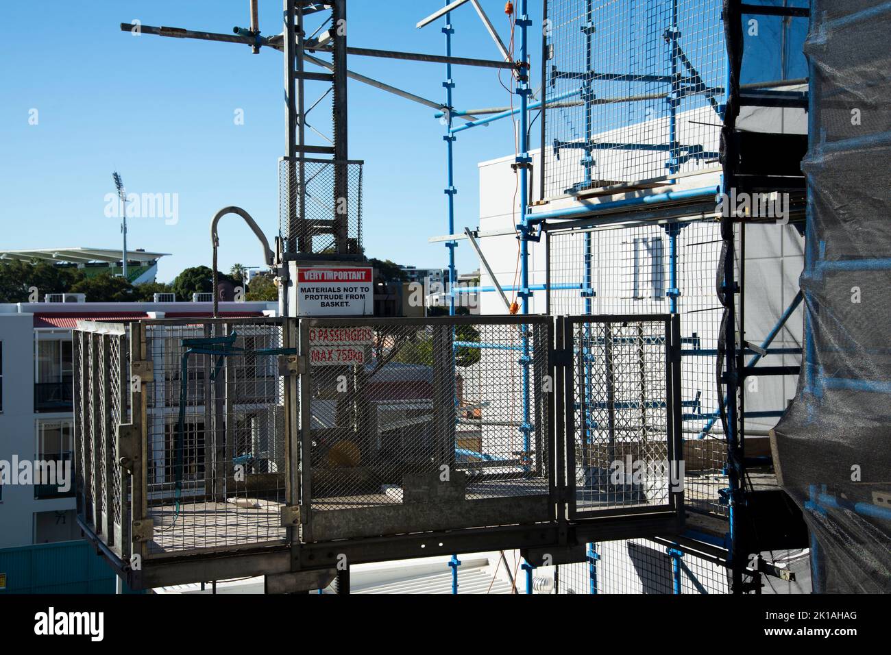 Construction Hoist in a Scaffold Stock Photo