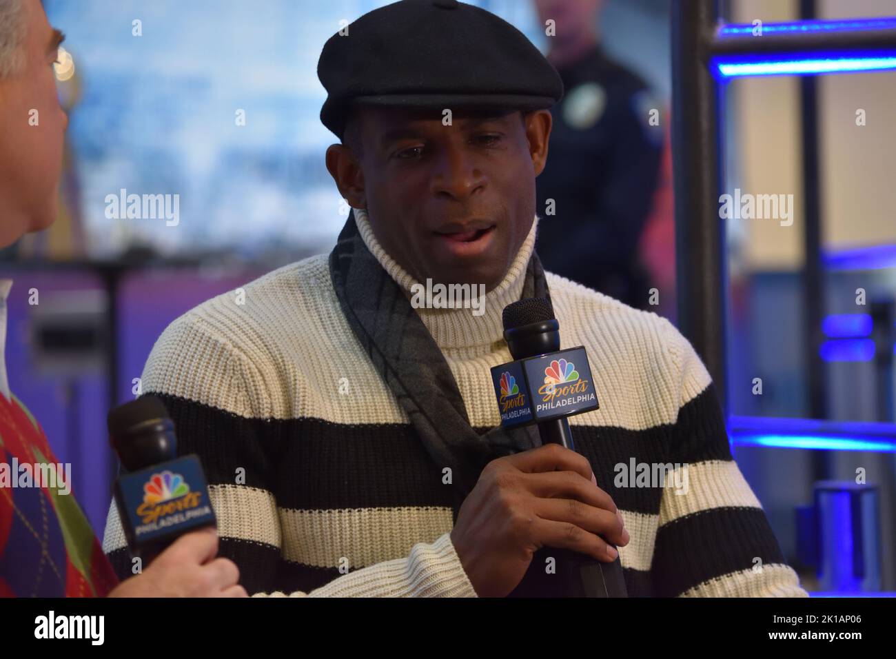 NFL Hall of Fame athlete Deion Sanders participates in media row at
