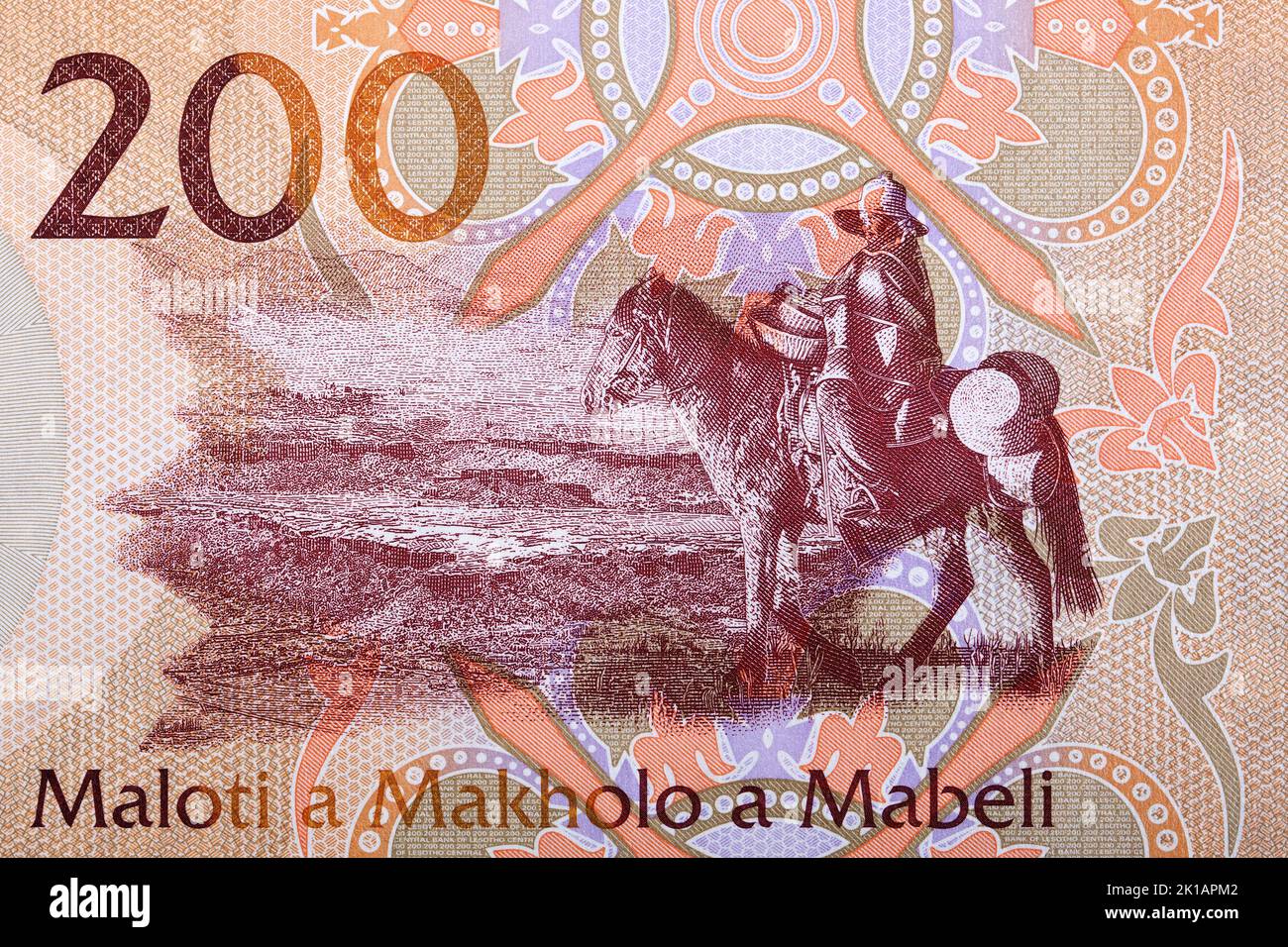 Man on horseback from banknotes of Lesotho - Maloti Stock Photo