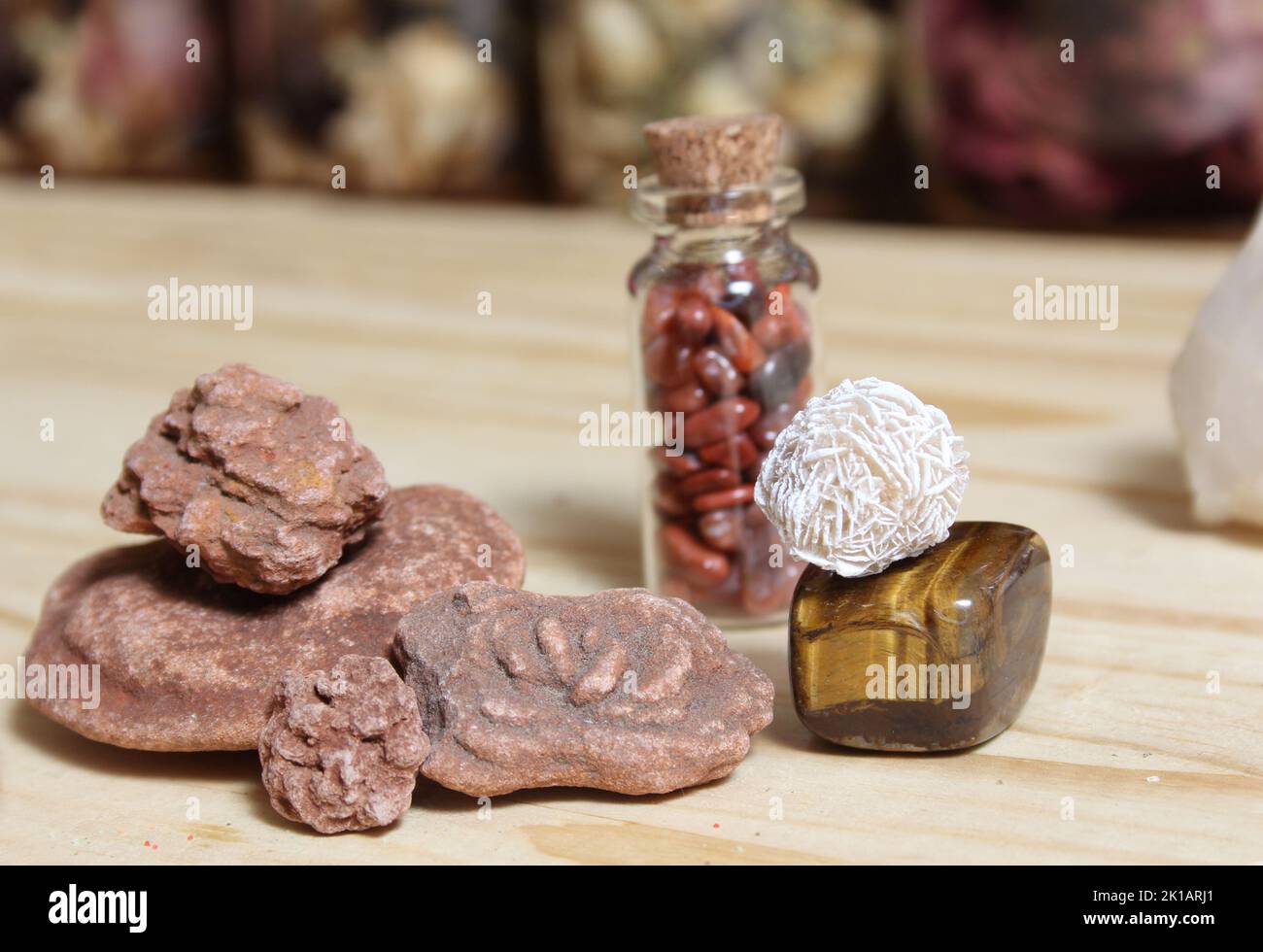 Desert Rose Rock Varieties With Jar of Agate Stones Stock Photo - Alamy