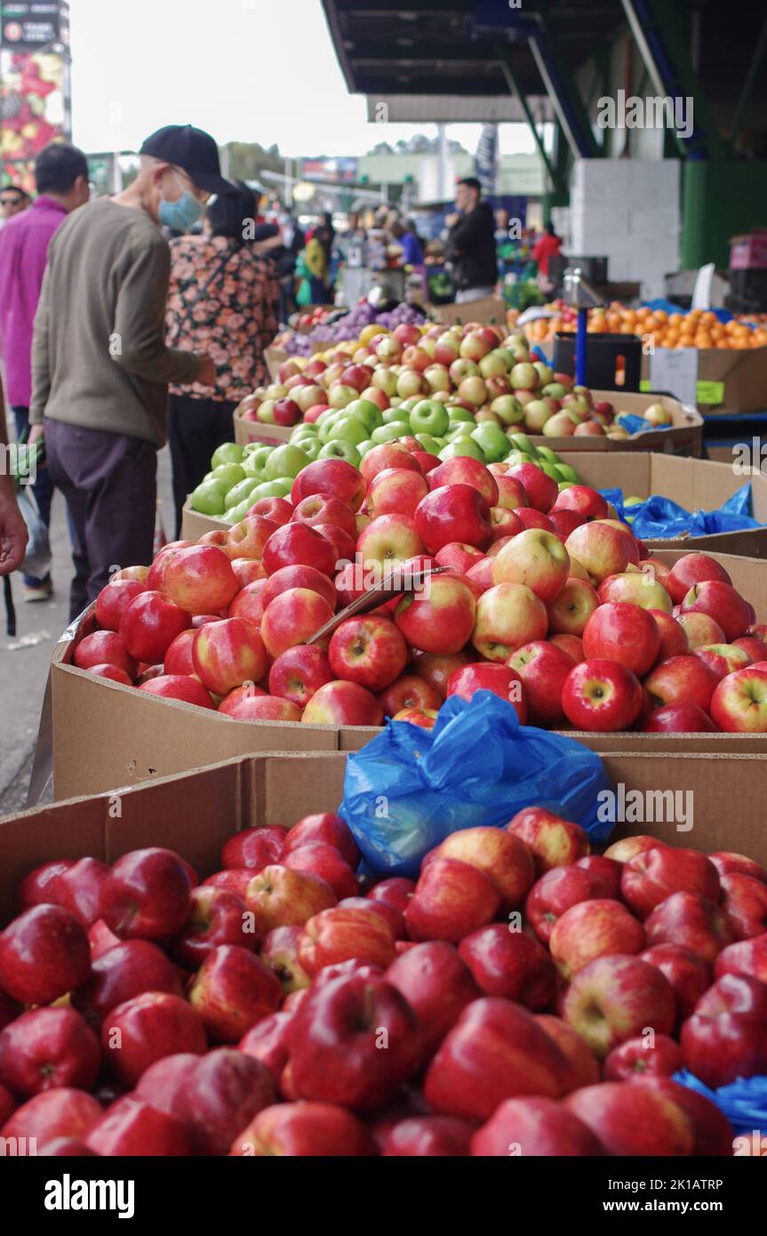 Man shopping for fruit at Paddy’s Fresh Food Market in Flemington