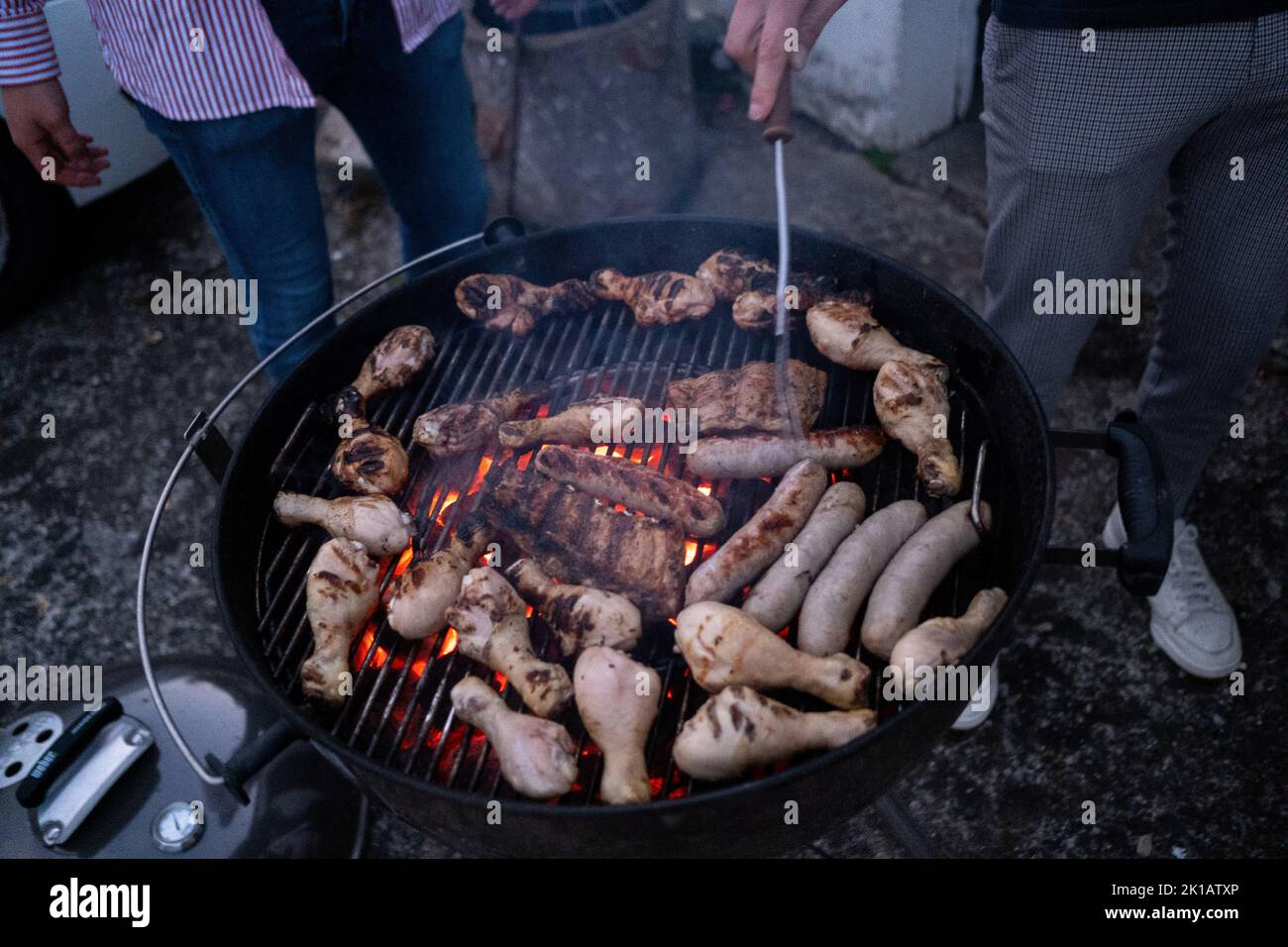 France, Brittany, Plerin on 2021-07-30. Summer night party of a group of young people in a holiday house in the agglomeration of Saint-Brieuc. Photogr Stock Photo