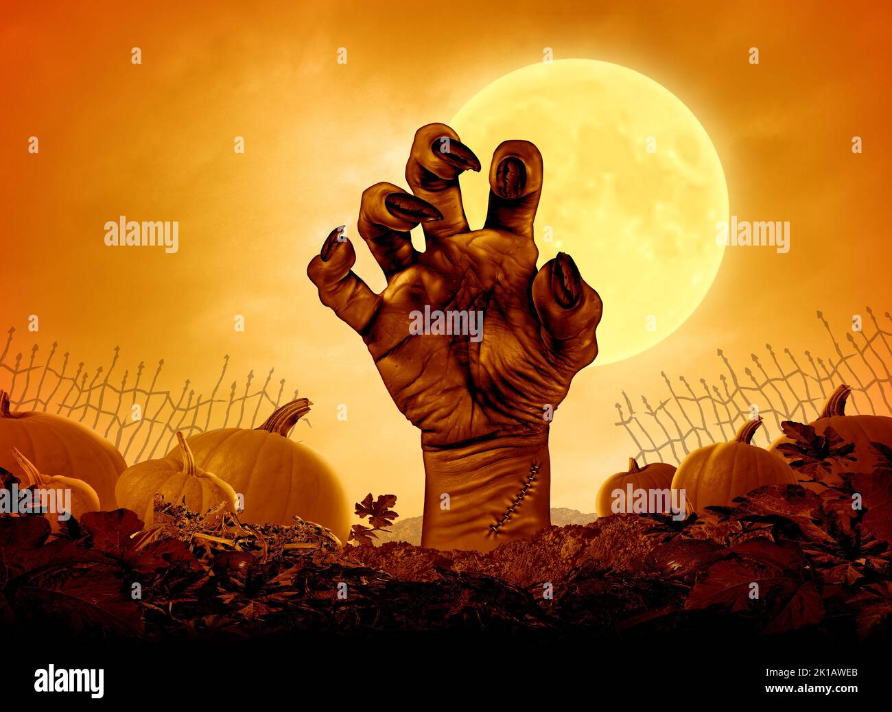 Halloween monster night poster and Autumn party background with a scary zombie hand with a yellow moon glowing on a grungy old creepy pumpkin patch. Stock Photo