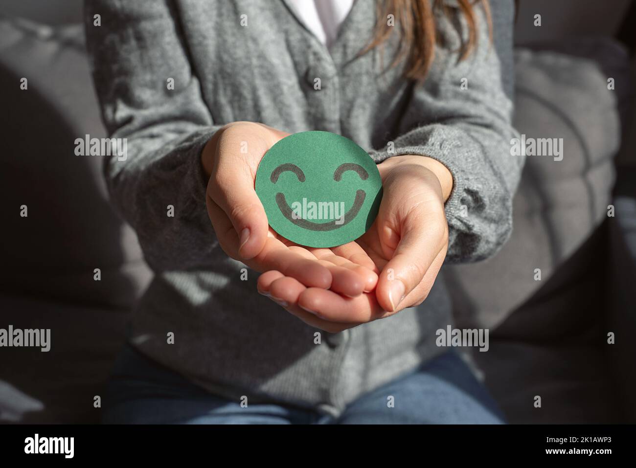 Good feedback rating, think positive, customer review, assessment, wellness, world mental health day, Compliment Day. Close-up of female hands holding Stock Photo