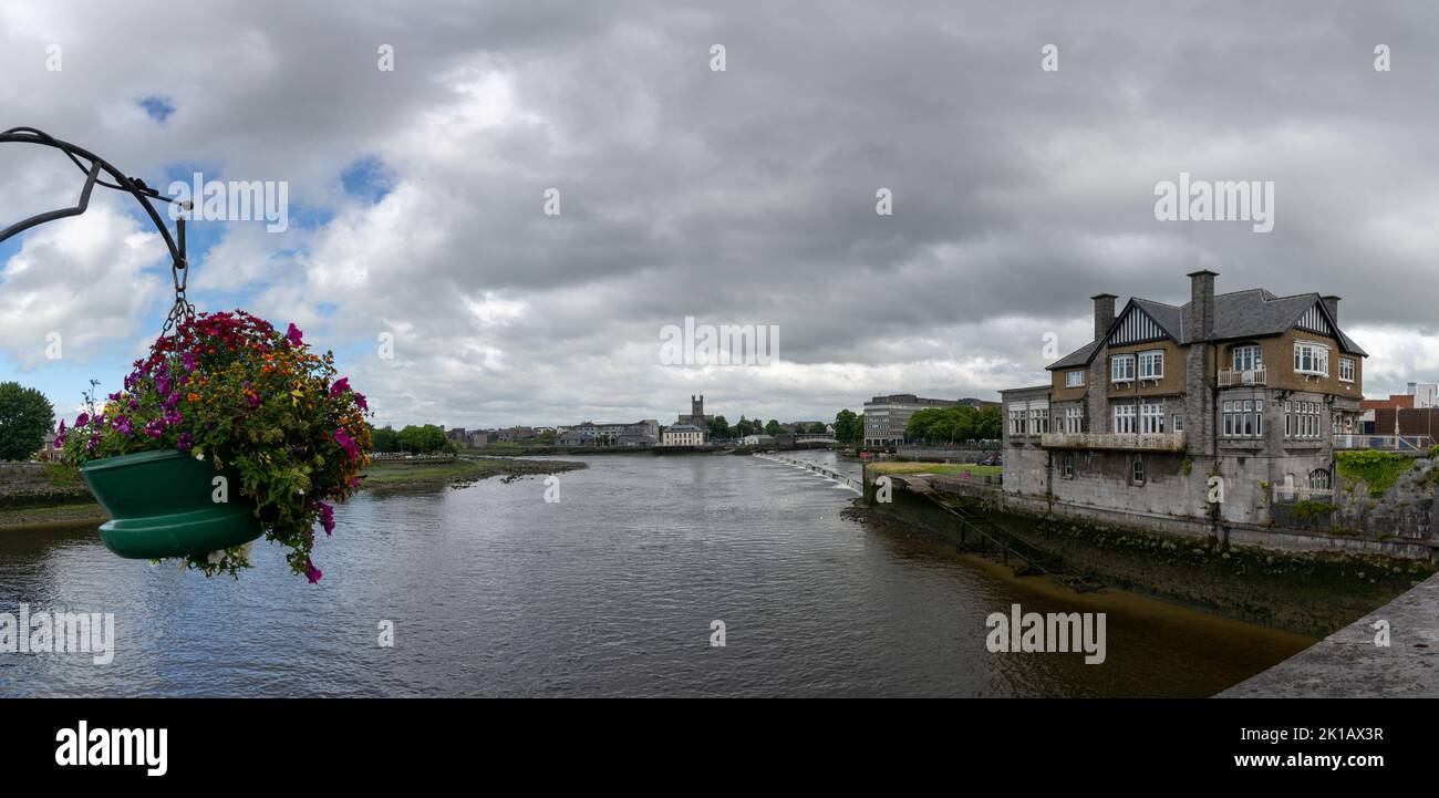 Limerick, Ireland - 2 August, 2022: the Shannon River as it flows through the city of Limerick Stock Photo