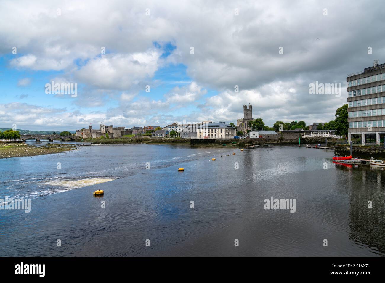 Limerick, Ireland - 2 August, 2022: cityscape of Limerick with the Shannon River and the Thomond Bridge Stock Photo