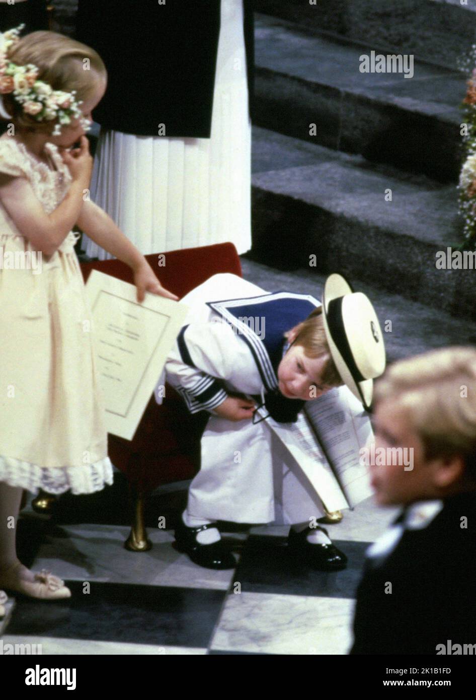 File photo dated 23/07/86 of six year-old Laura Fellowes (left) points at her three year-old cousin Prince William, son of the Prince and Princess of Wales, during the wedding ceremony of Sarah Ferguson and the Duke of York at Westminster Abbey. The late monarch had eight grandchildren, who are performing a vigil around her coffin on Saturday, and 12 great-grandchildren. The Queen was grandmother to eight grandchildren, who all held a deep respect and admiration for their Granny. Peter Phillips, Zara Tindall, the Prince of Wales, the Duke of Sussex, Princess Beatrice, Princess Eugenie, Lady Lo Stock Photo