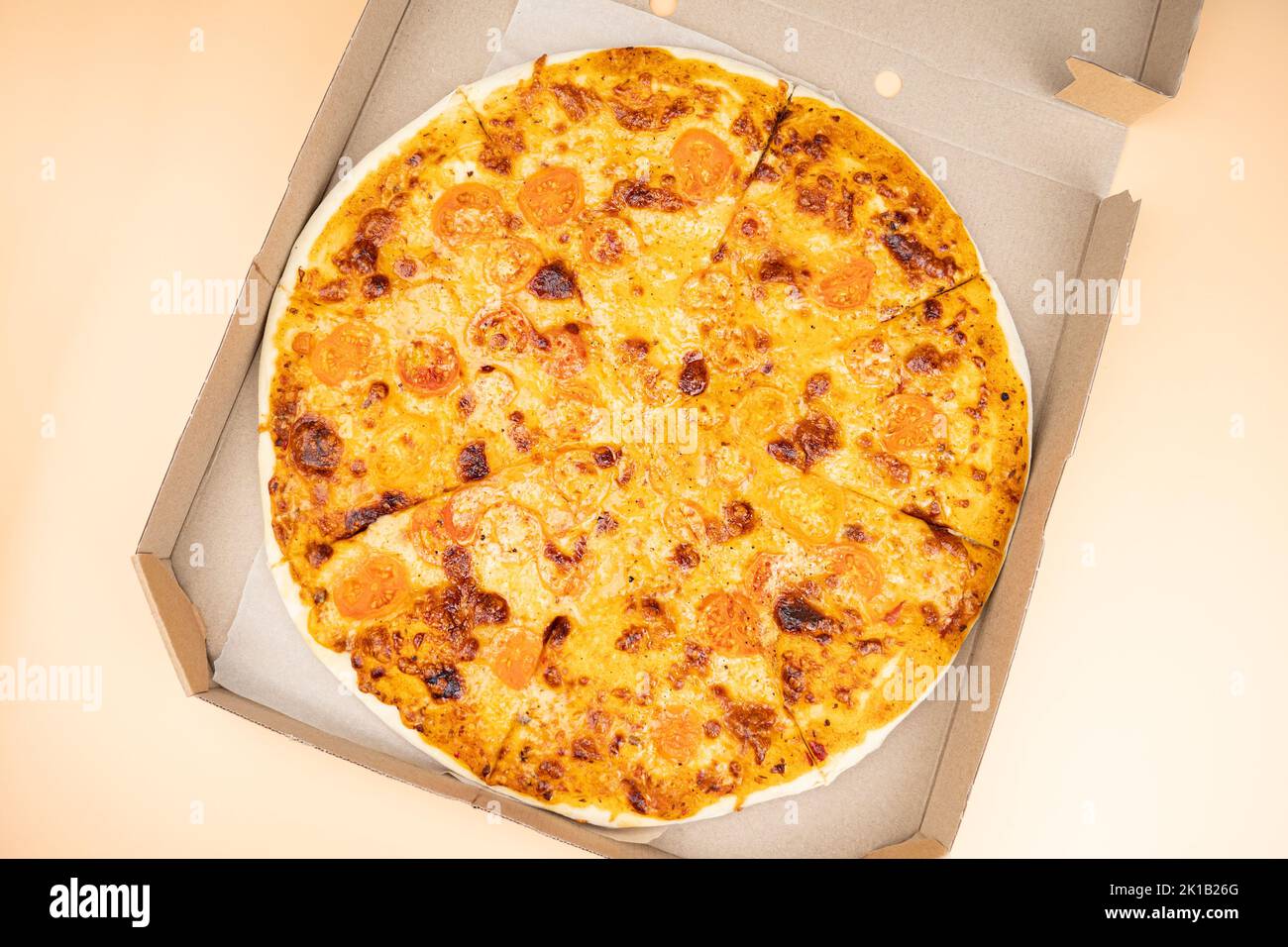 hands open box with mozzarella cheese pizza, delivery pizza. Stock Photo
