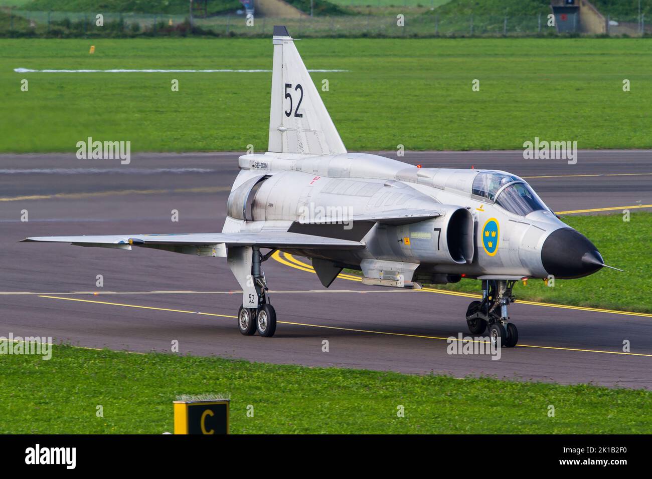 A swedish Saab JA 37 Viggen fighter jet performing a dynamic display at the airshow Airpower in Zeltweg Stock Photo