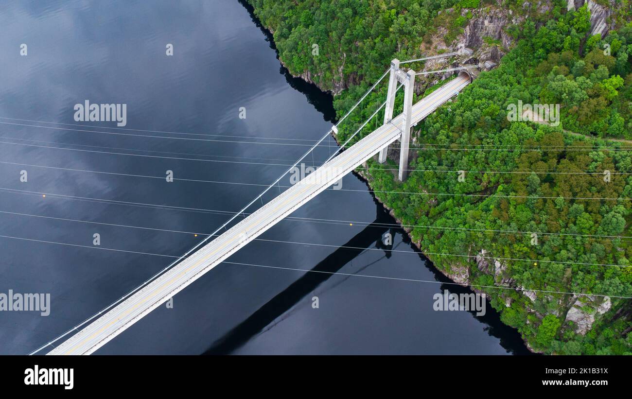 Aerial view of the Fedafjorden bru bridge with crossing power lines and a tunnel portal Stock Photo