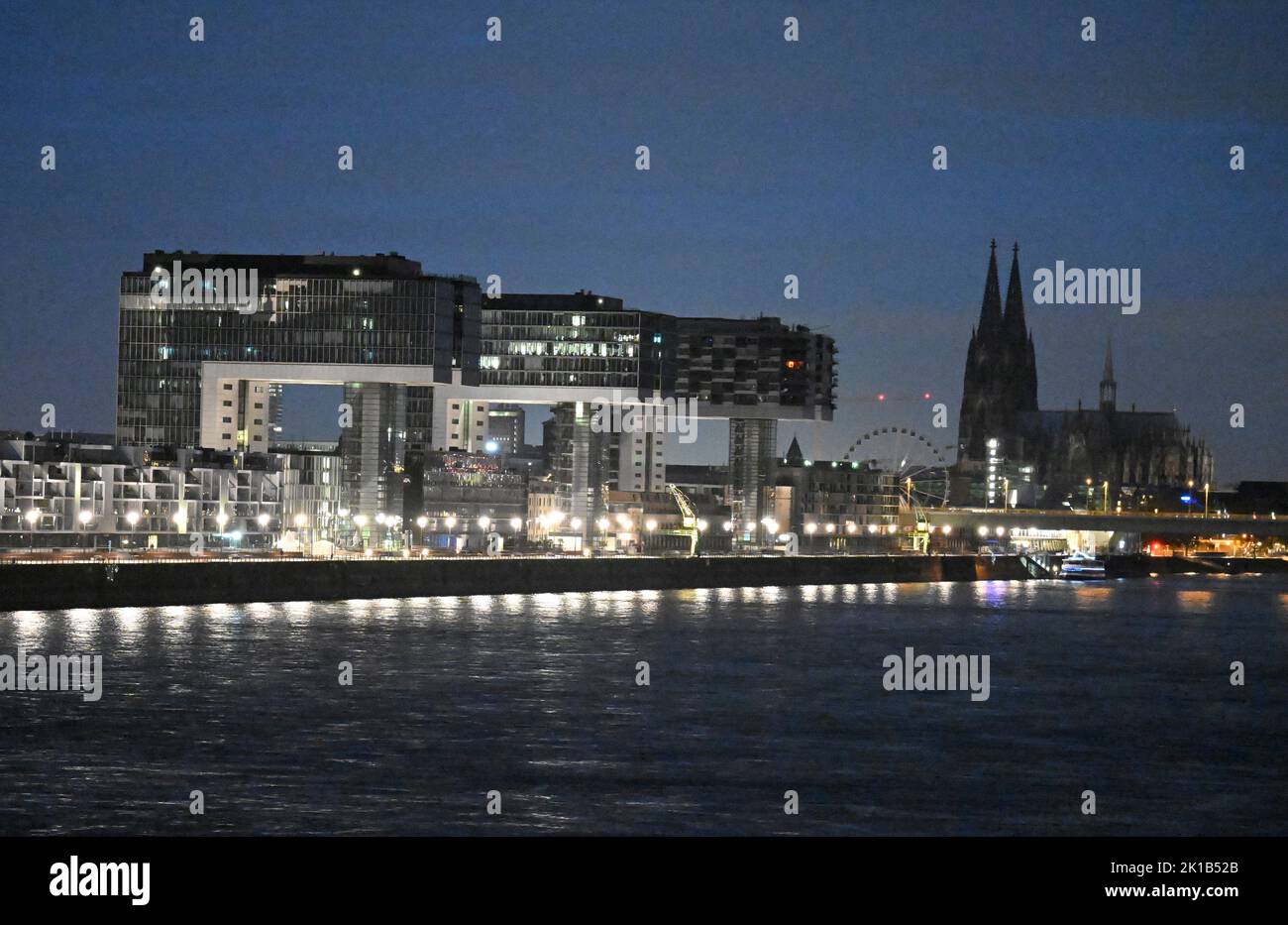 Cologne, Germany. 17th Sep, 2022. The three crane buildings and Cologne Cathedral are not illuminated at night. By not illuminating the landmark cathedral, the city of Cologne wants to make a contribution to counteracting the impending energy shortage. Credit: Roberto Pfeil/dpa/Alamy Live News Stock Photo