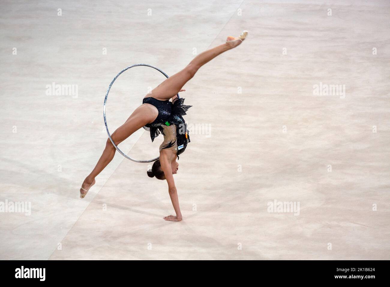 Moscow, Russia. 12th of September, 2022. Anastasia Guzenkova performs her hoop routine in a qualification at the 2022 All-Russian Summer Spartakiad in Rhythmic Gymnastics at Irina Viner-Usmanova Gymnastics Palace in Luzhniki in Moscow, Russia Stock Photo