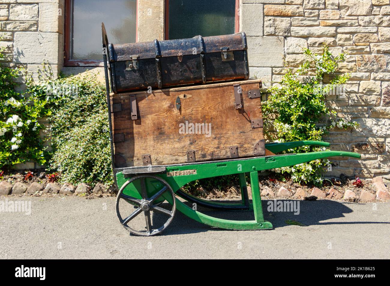 vintage luggage railway hand cart trolley with trunks at Beamish open air museum county durham Stock Photo