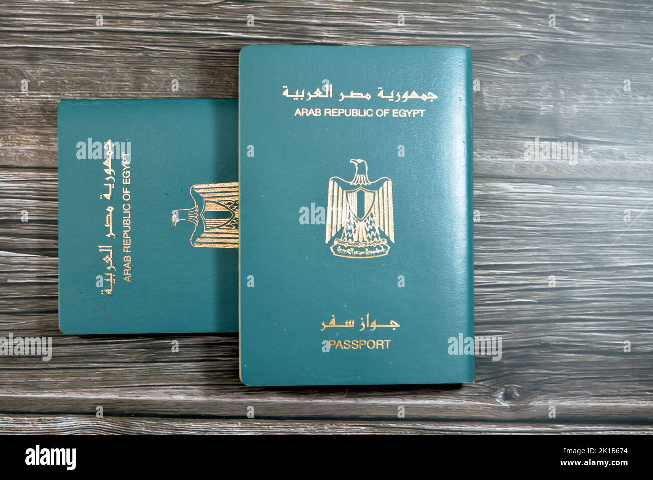 Egyptian passport isolated on wooden background, Arab republic of Egypt