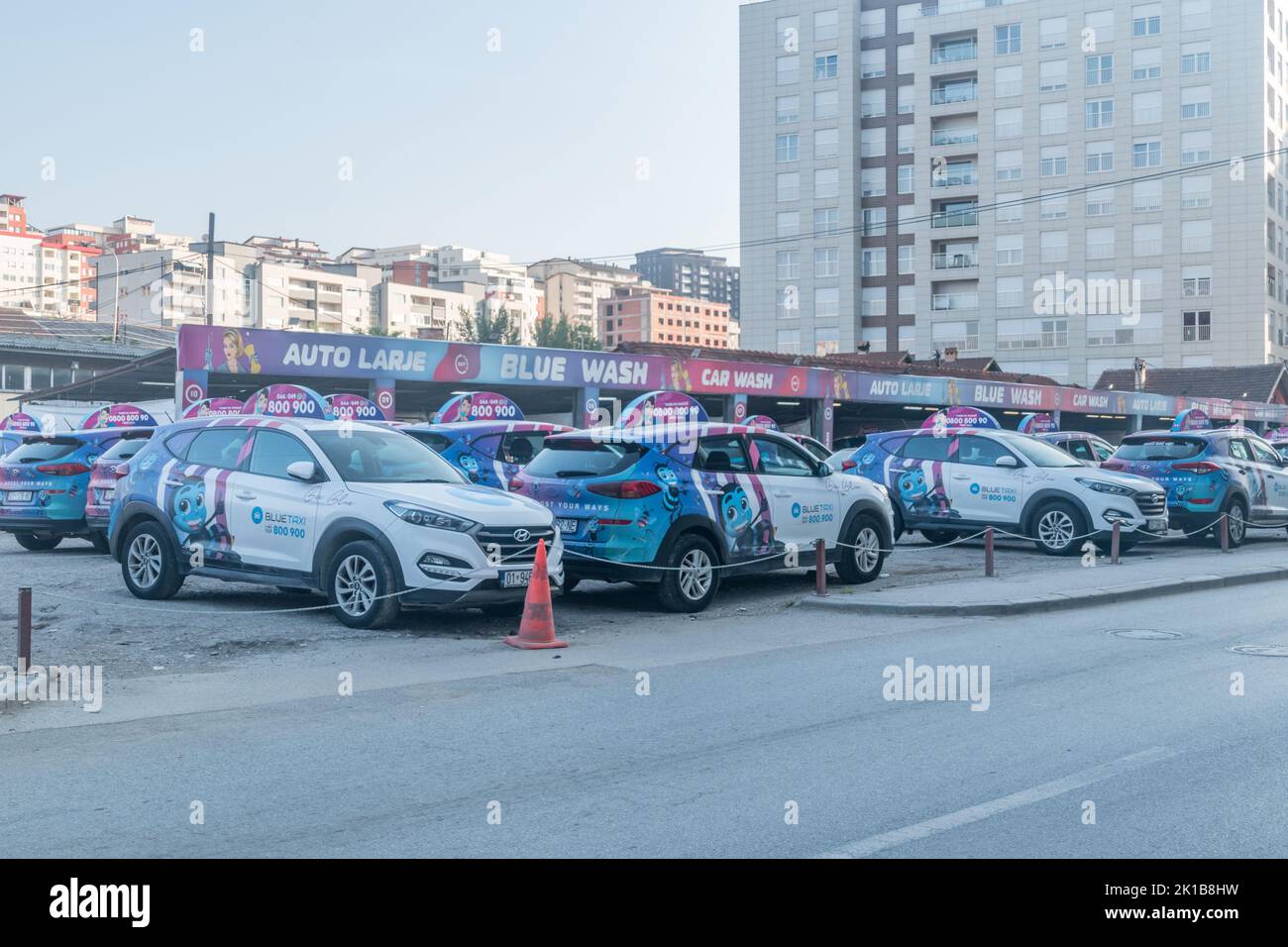 Pristina, Kosovo June 5, 2022 Car parking with Blue Taxi cars Stock