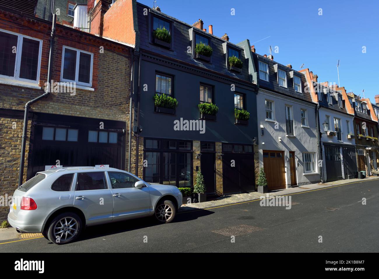 Terraced Luxury Residential Mews houses, Pavilion Road, Chelsea, West London, United Kingdom Stock Photo