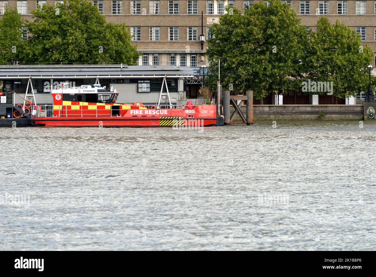 Fireboat moored at the Lambeth River Fire Station, Albert Embankment, Lambeth, London, United Kingdom Stock Photo