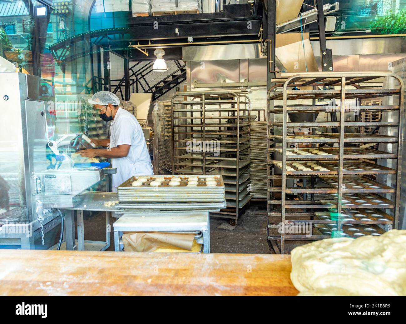 San Francisco, USA June 7, 2022 baker man in the famous old bakery Boudin since 1849 at