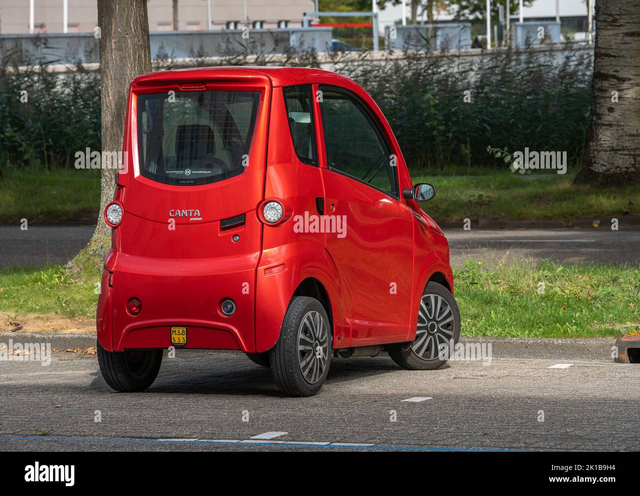 Amsterdam, The Netherlands, 16.09.2022, Dutch 2-seat microcar Canta Premium in red colour Stock Photo