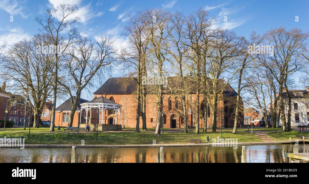 Panorama of the historic Nicolai church at the harbor of Appingedam, Netherlands Stock Photo