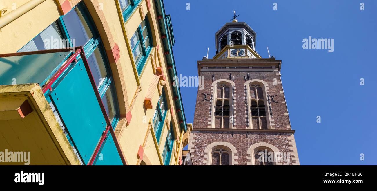 Panorama of a colorful house and belfry in Kampen, Netherlands Stock Photo