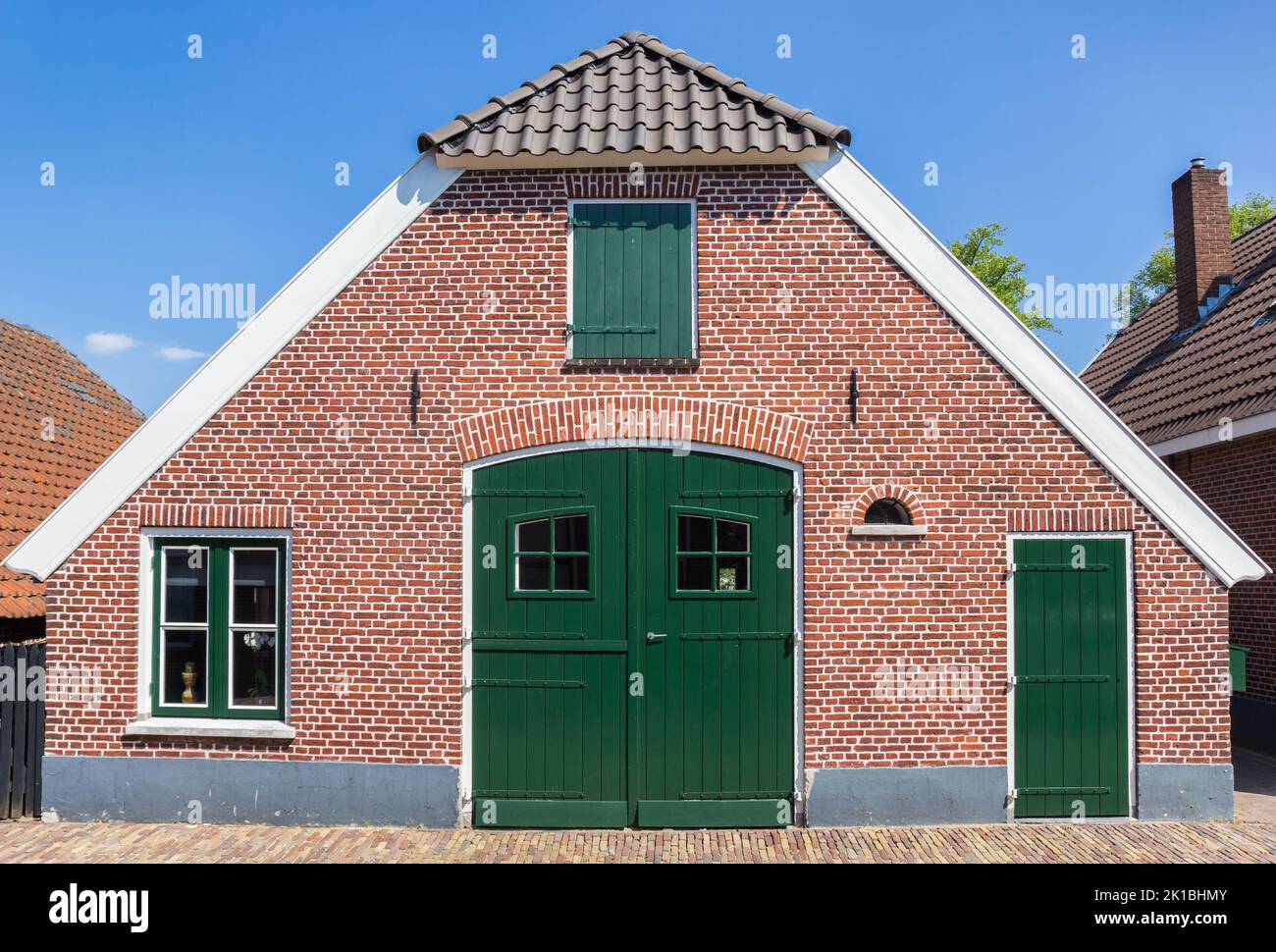 green door in a traditional house in Rijssen, Netherlands Stock Photo