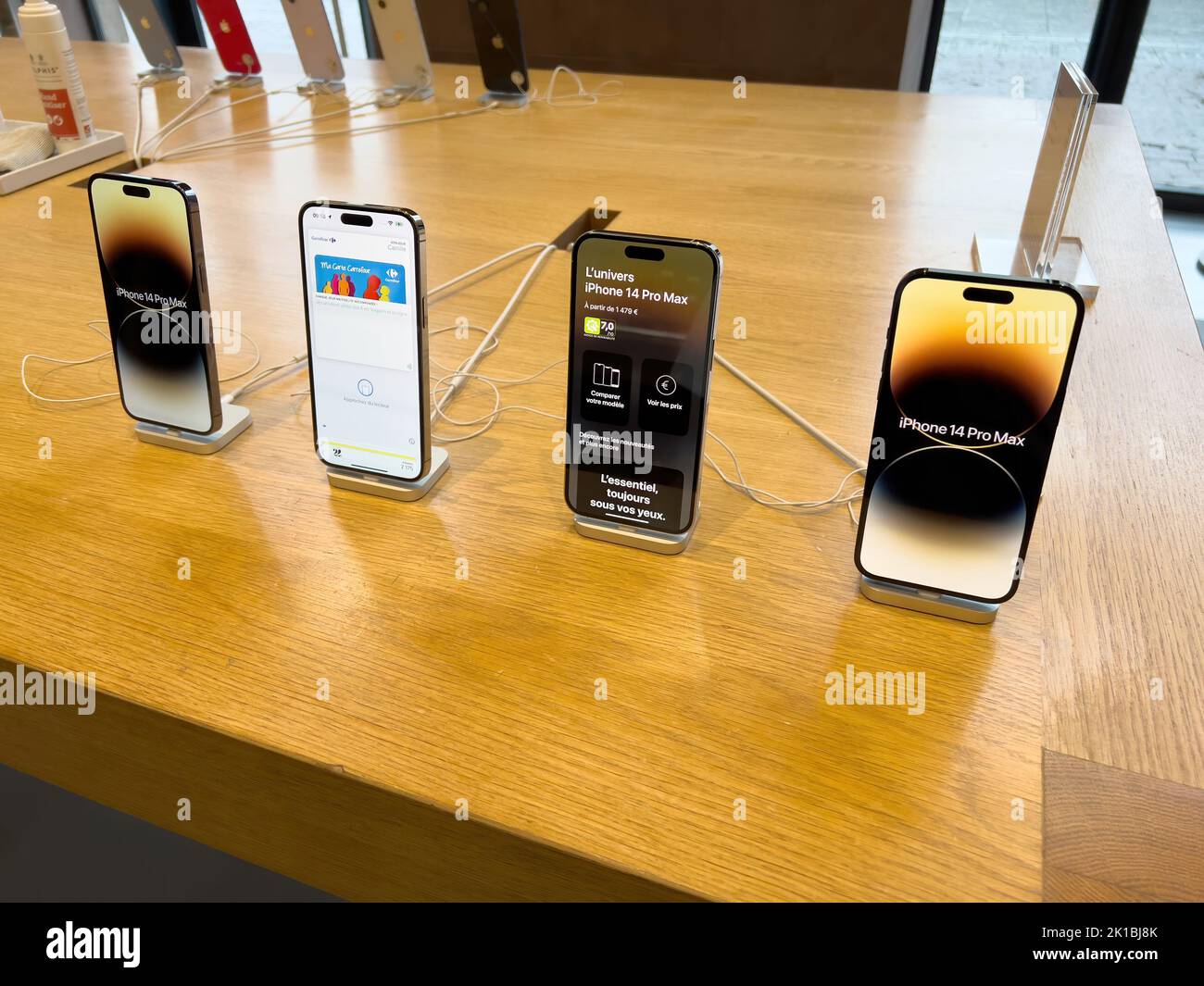 Paris, France - Sep 16, 2022: All range of the Apple Computers iPhone 14, 14 Pro, Pro Max on sale during the launch day featuring Always-on display, 48-megapixel camera and Dynamic Island Stock Photo