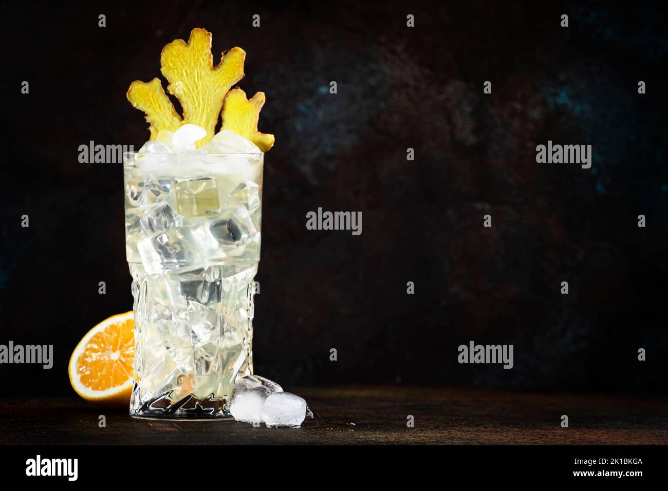 Gin mule alcoholic cocktail with dry gin, lemon juice, soda, lime and