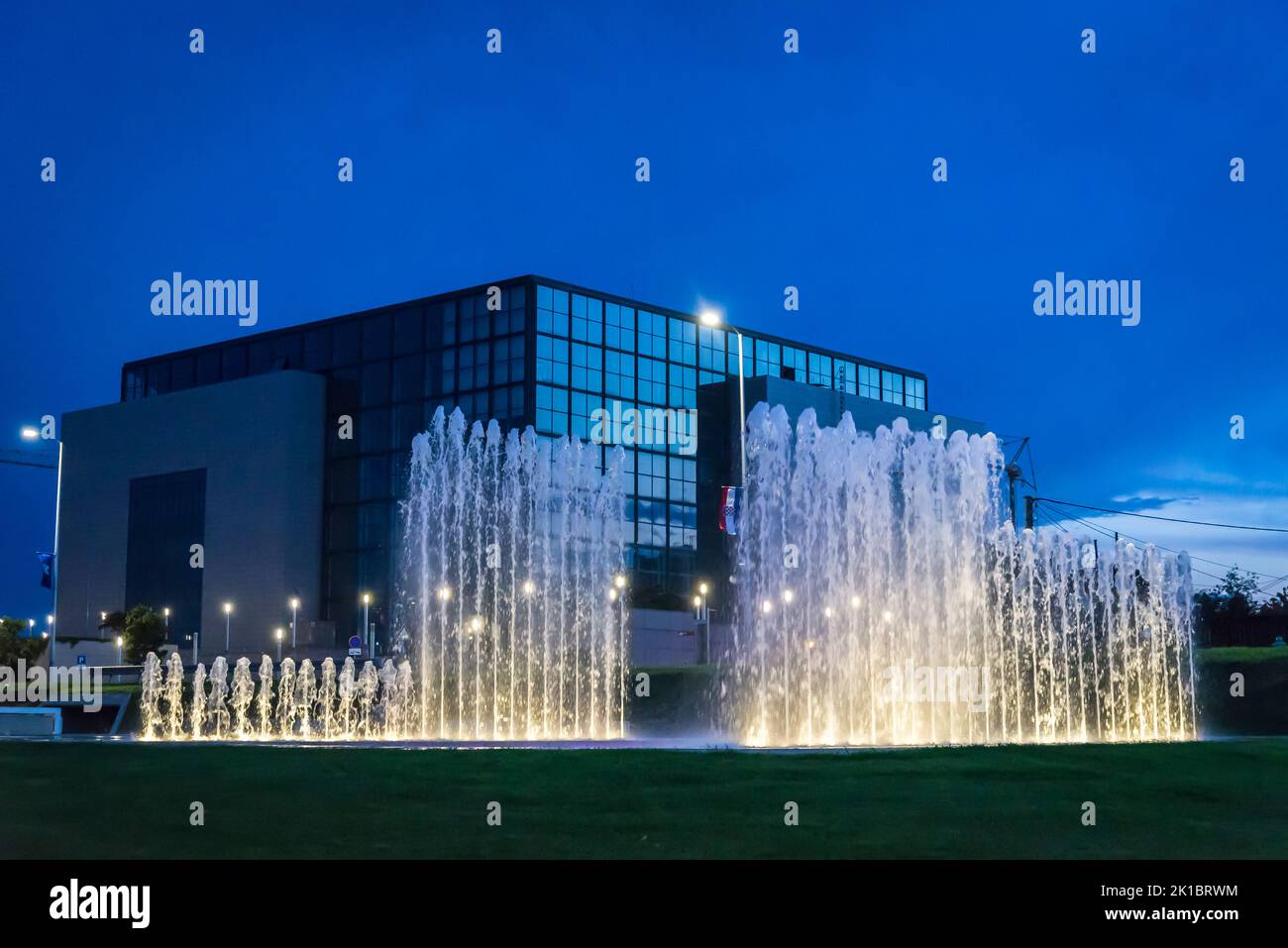 National and University Library at night and fountains in the Park of Fountains at the avenue of Hrvatske Bratske Zajednice, Zagreb, Croatia Stock Photo