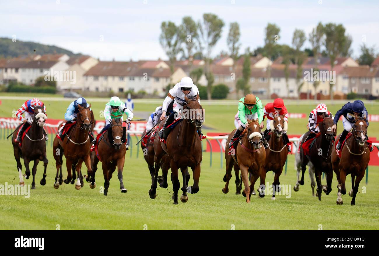 Dusky Lord ridden by jockey Jack Mitchell (centre) wins the Virgin Bet Ayr Silver Cup Handicap during the Virgin Bet Ayr Gold Cup day at Ayr Racecourse, Ayr. Picture date: Saturday September 17, 2022. Stock Photo