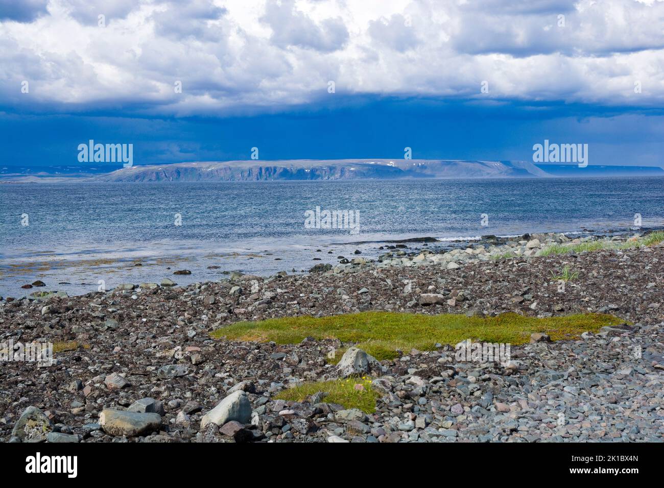 Stormy clouds over fjord, Hamningberg, Varanger, Norway Stock Photo