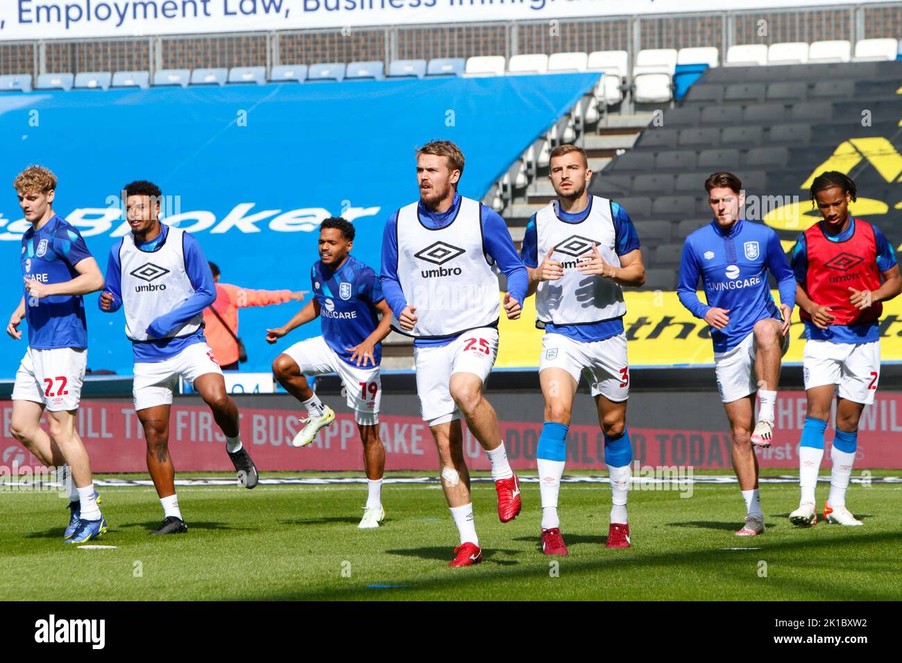 players-of-huddersfield-town-warm-up-before-the-sky-bet-championship