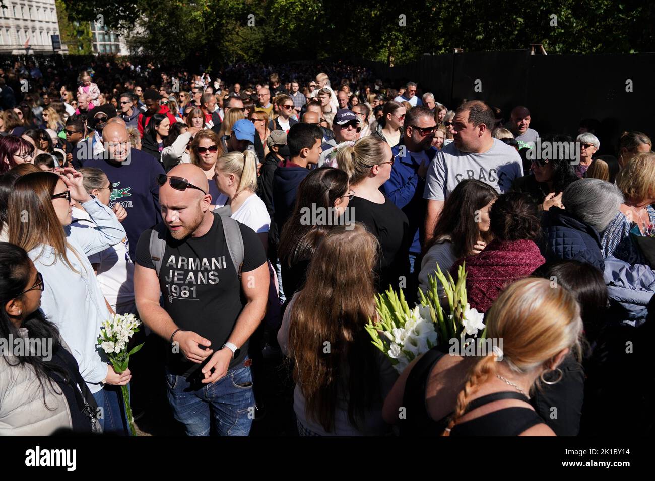 Members of the public queue to gain access to Green Park in London, as they wait to lay flowers and tributes to Queen Elizabeth II ahead of her funeral on Monday. Picture date: Saturday September 17, 2022. Stock Photo