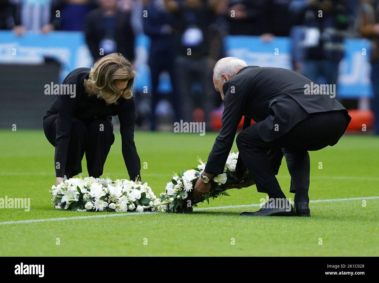 Chairman of AFC Bournemouth Jeff Mostyn and Newcastle United's co-owner Amanda Staveley lay wreaths in memory of Queen Elizabeth II, ahead of the Premier League match at St James' Park, Newcastle. Picture date: Saturday September 17, 2022. Stock Photo