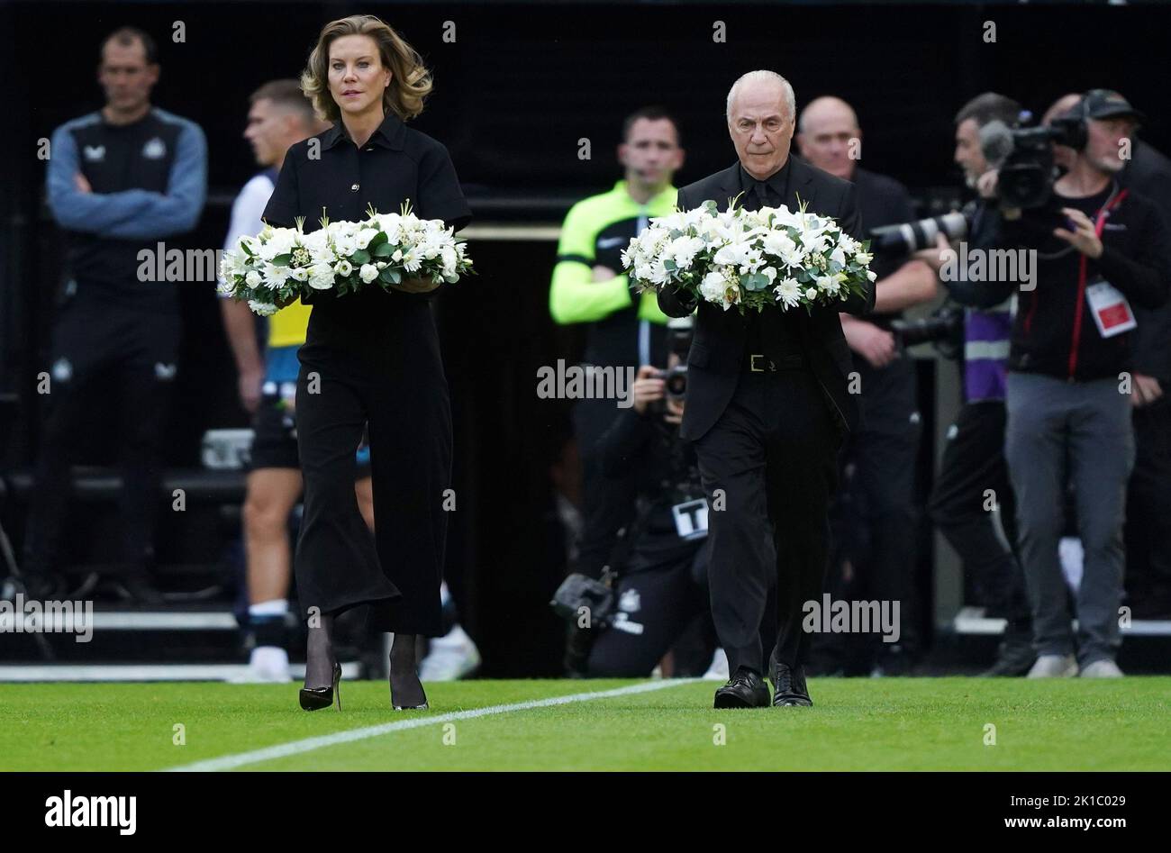 Chairman of AFC Bournemouth Jeff Mostyn and Newcastle United's co-owner Amanda Staveley lay wreaths in memory of Queen Elizabeth II, ahead of the Premier League match at St James' Park, Newcastle. Picture date: Saturday September 17, 2022. Stock Photo