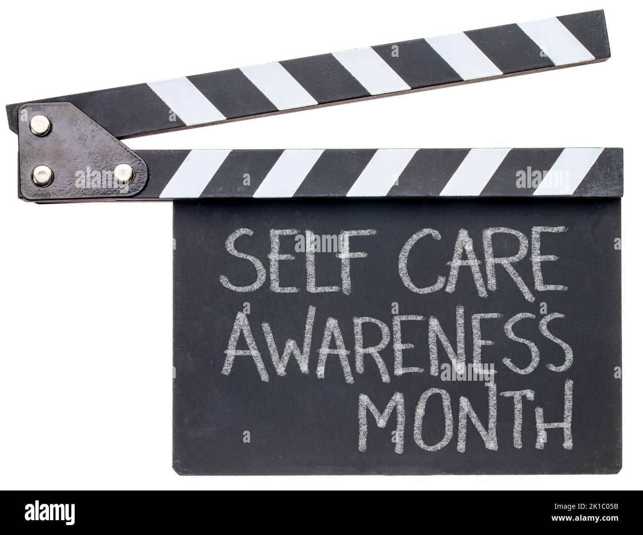 self care awareness month - white chalk writing on a clapboard, reminder of an annual event Stock Photo