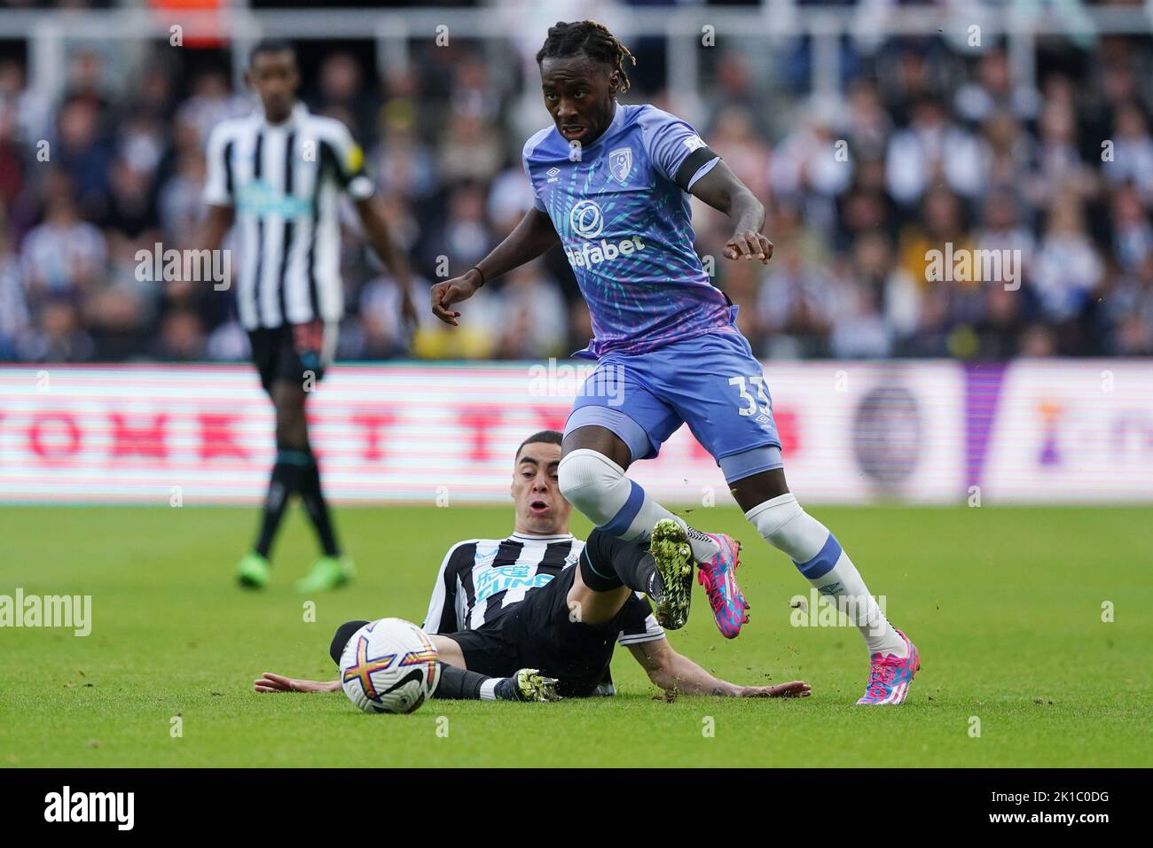 Newcastle United's Miguel Almiron and Bournemouth's Jordan Zemura (right) battle for the ball during the Premier League match at St James' Park, Newcastle. Picture date: Saturday September 17, 2022. Stock Photo