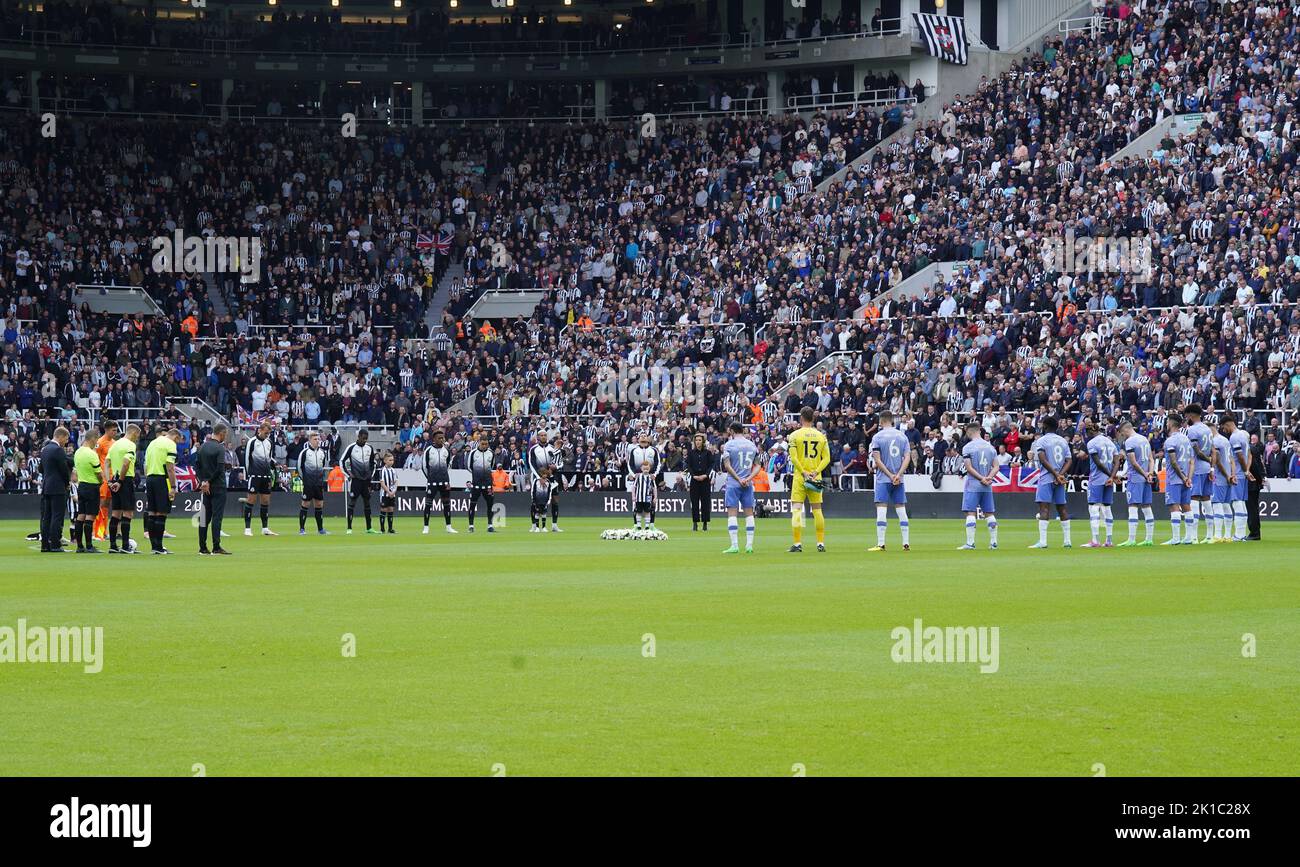 Players, officials and fans observe a minute's silence in memory of Queen Elizabeth II, ahead of the Premier League match at St James' Park, Newcastle. Picture date: Saturday September 17, 2022. Stock Photo