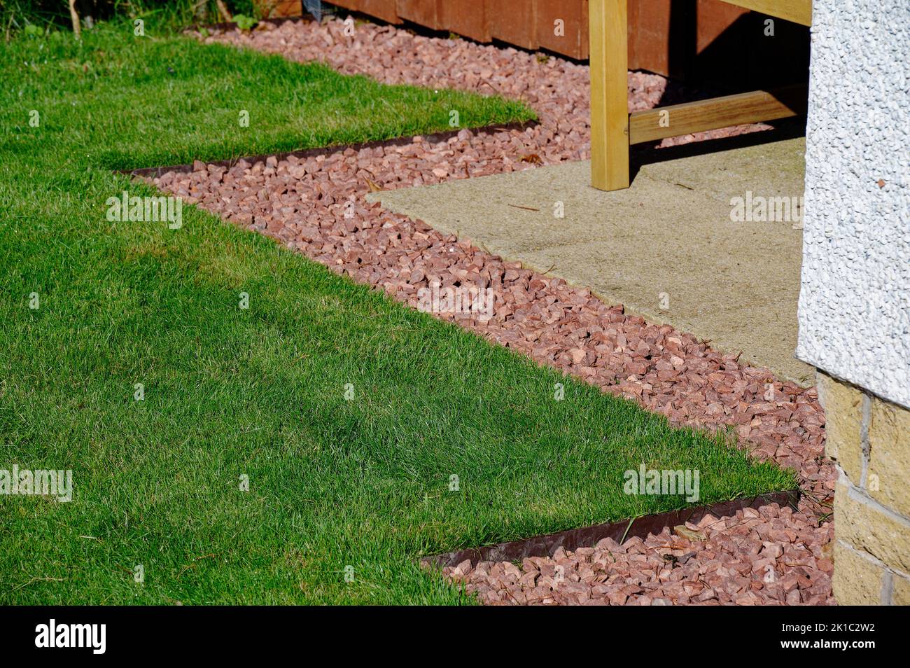 Lawn edging made of metal showing straight and neat finish Stock Photo