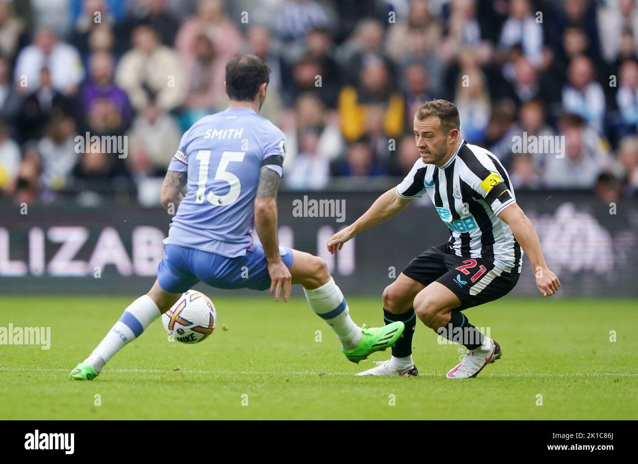 Bournemouth's Adam Smith and Newcastle United's Ryan Fraser (right) battle for the ball during the Premier League match at St James' Park, Newcastle. Picture date: Saturday September 17, 2022. Stock Photo