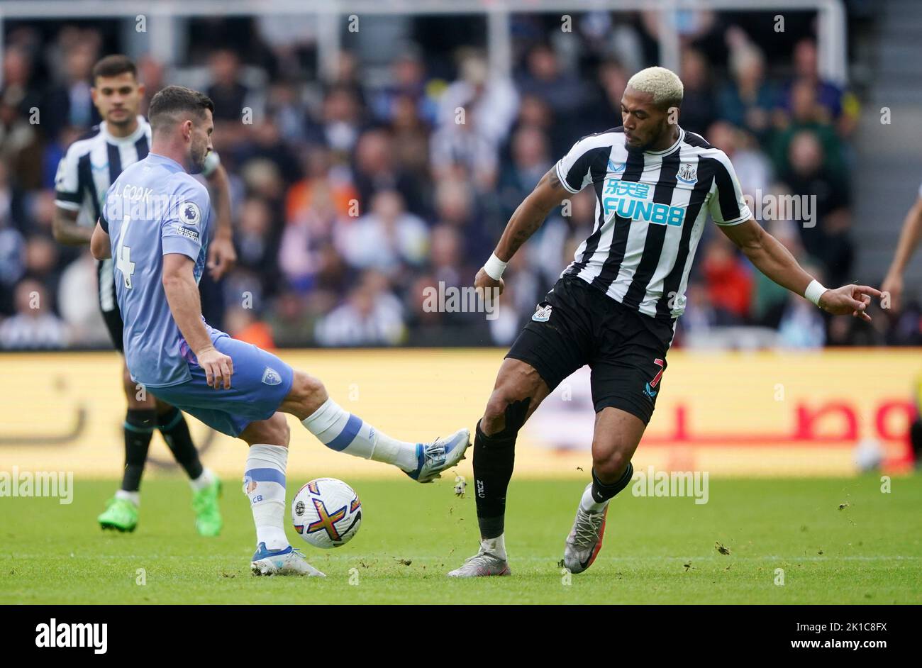Bournemouth's Lewis Cook and Newcastle United's Joelinton (right) battle for the ball during the Premier League match at St James' Park, Newcastle. Picture date: Saturday September 17, 2022. Stock Photo