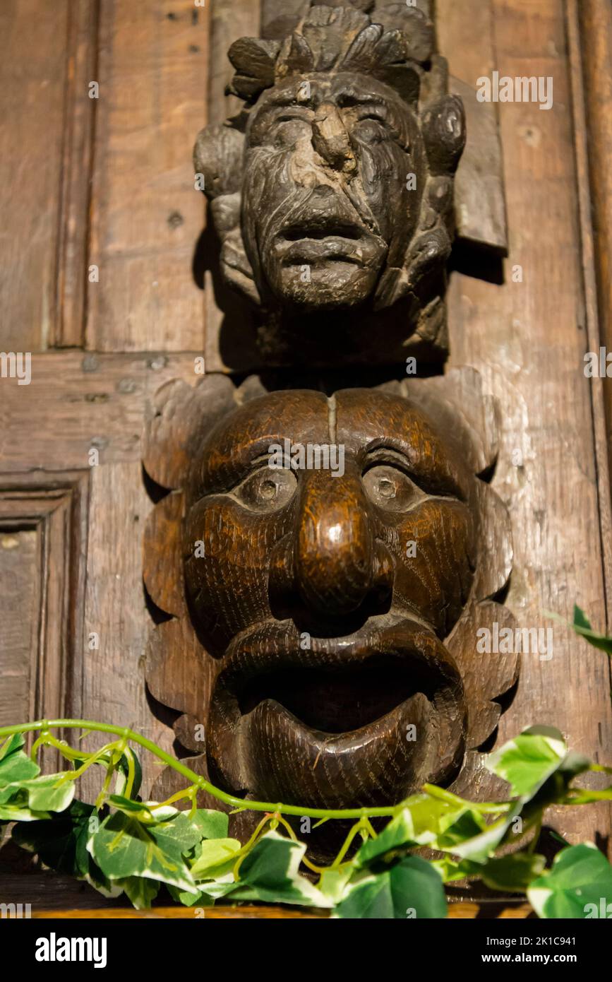 Animal head carved in wood above fireplace, Eastgate House, a Grade I listed Elizabethan townhouse notable for its association with author Charles Dickens, now it is a Dickens Museum, Rochester, Kent, England, UK Stock Photo