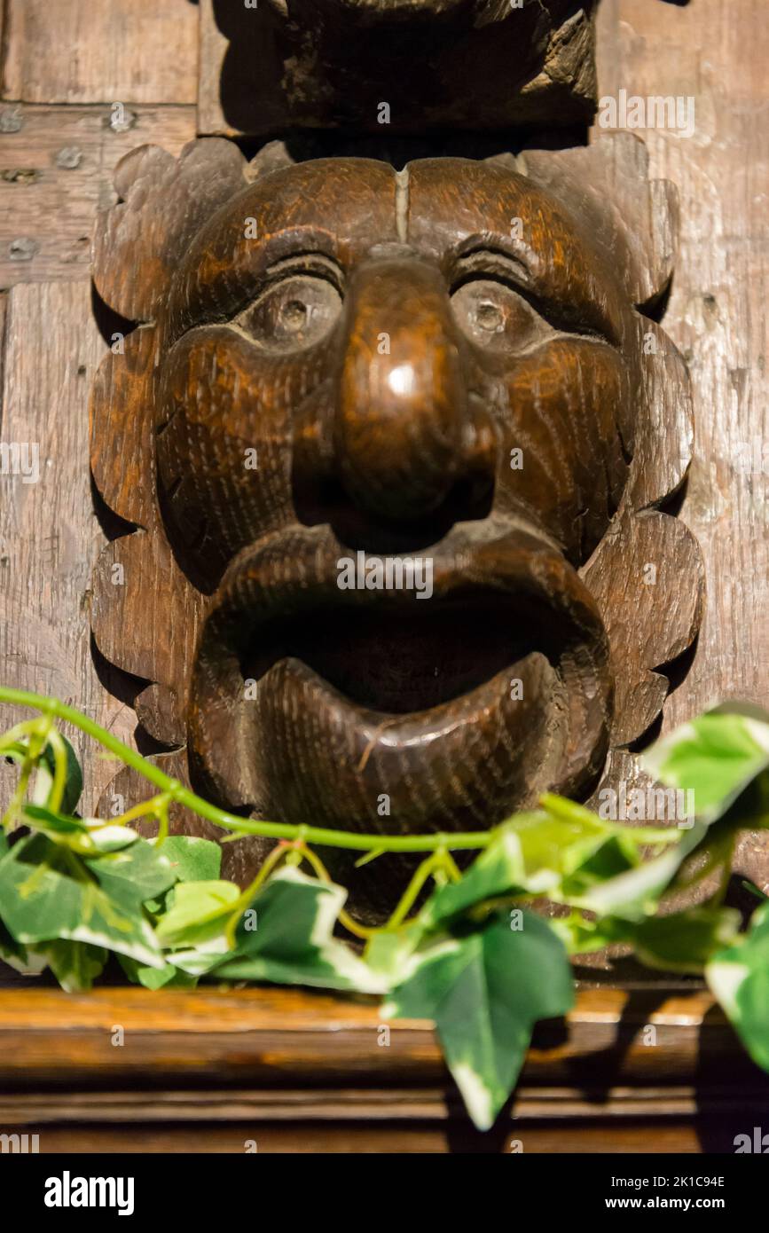 Animal head carved in wood above fireplace, Eastgate House, a Grade I listed Elizabethan townhouse notable for its association with author Charles Dickens, now it is a Dickens Museum, Rochester, Kent, England, UK Stock Photo