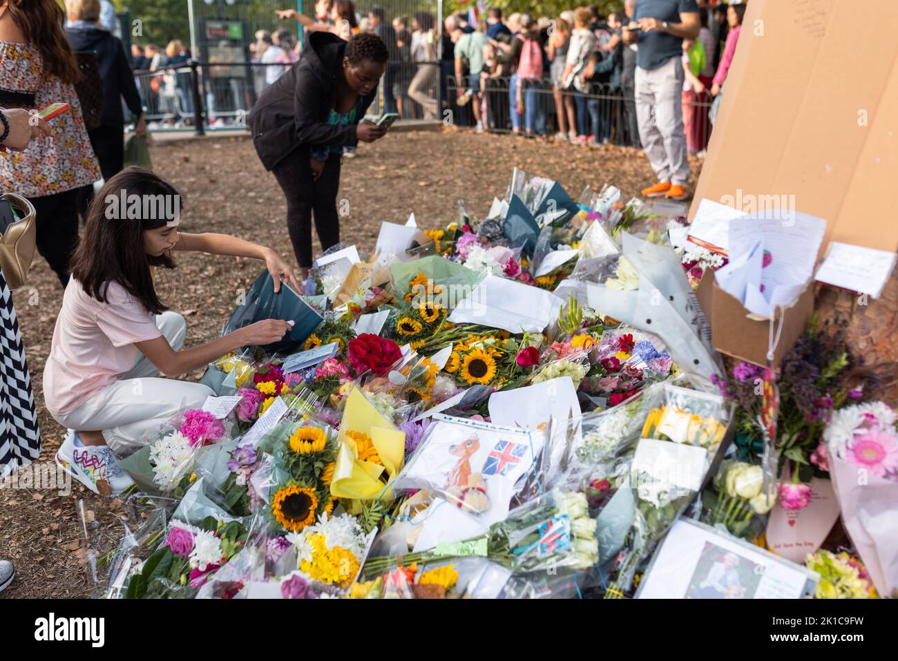 London, UK September 11 2022 Flowers being laid outside Buckingham