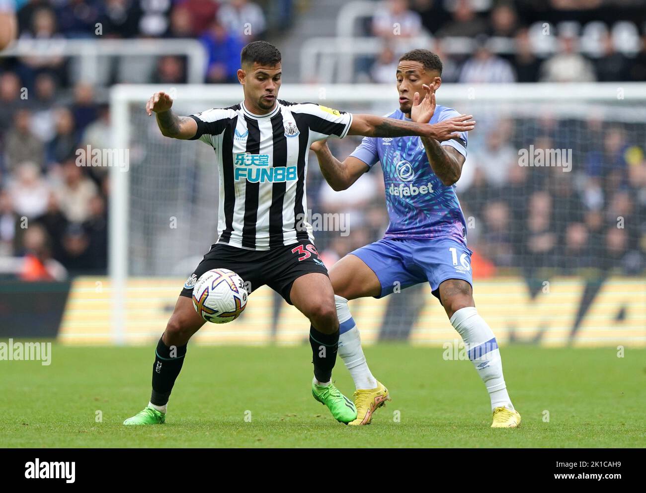 Newcastle United's Bruno Guimaraes and Bournemouth's Marcus Tavernier (right) battle for the ball during the Premier League match at St James' Park, Newcastle. Picture date: Saturday September 17, 2022. Stock Photo