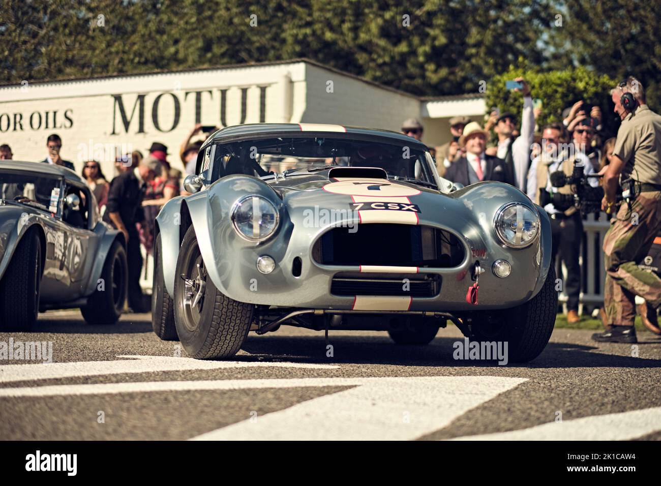 Goodwood, Chichester, UK. 17th Sept, 2022. Touring Car legend Andy Priaulx drives 1964 AC Cobra for the Royal Automobile Club TT Celebration during the 2022 Goodwood Revival (Photo by Gergo Toth / Alamy Live News) Stock Photo